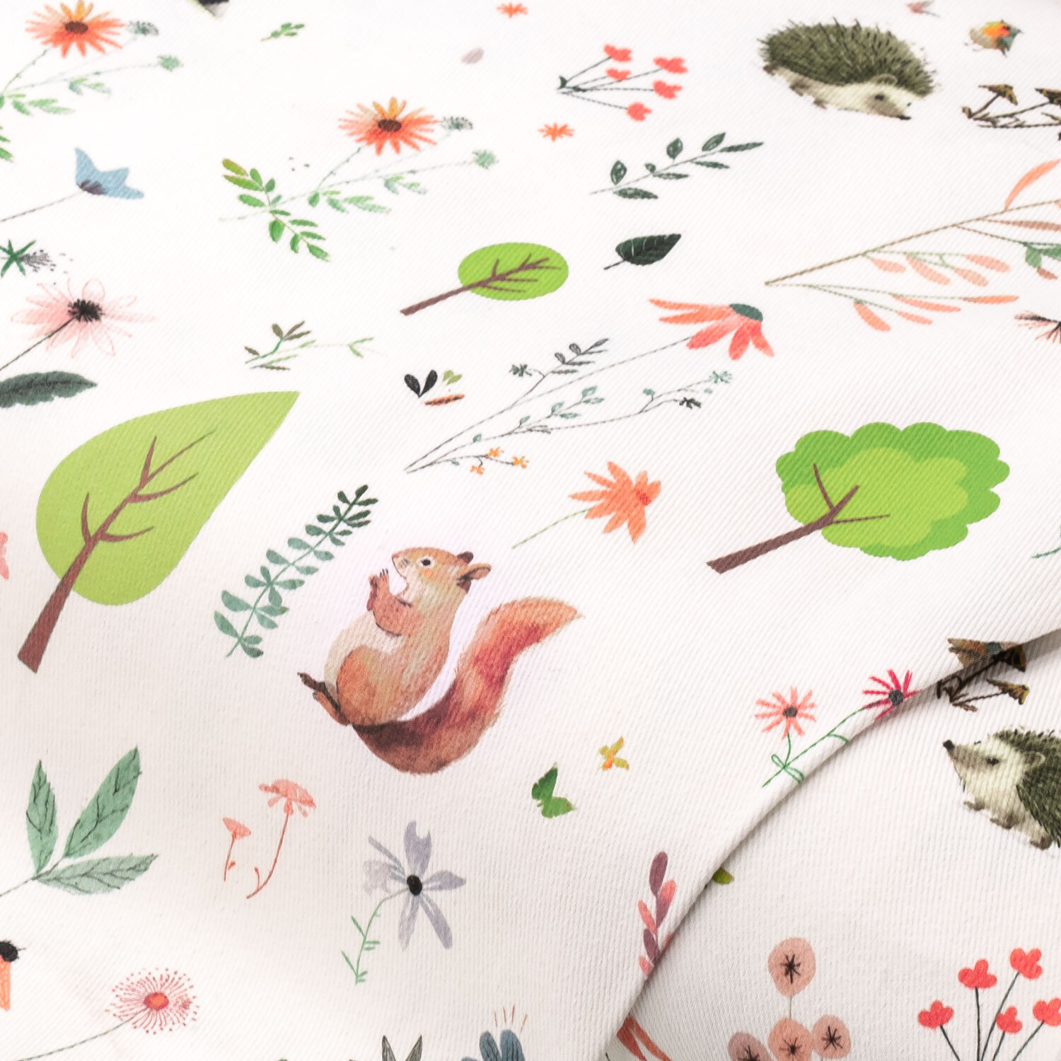 "Tissu sergé de coton ""animaux, fleurs et arbres"", blanc/coloré, série ""Ravi"""